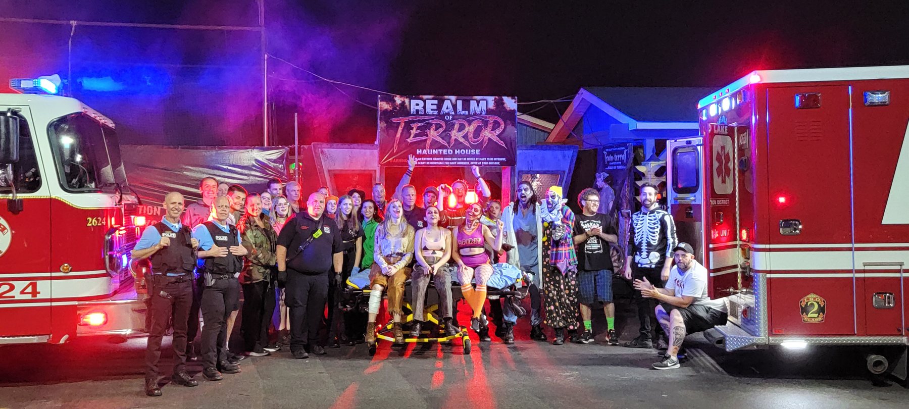 Another behind-the-scenes cast and crew group shot from the exterior sequence.