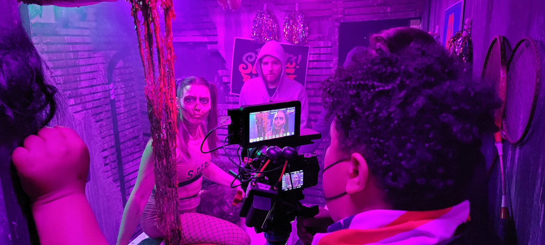 Cydney Moody as Celeste during a practical-effects setup on Haunt Season.