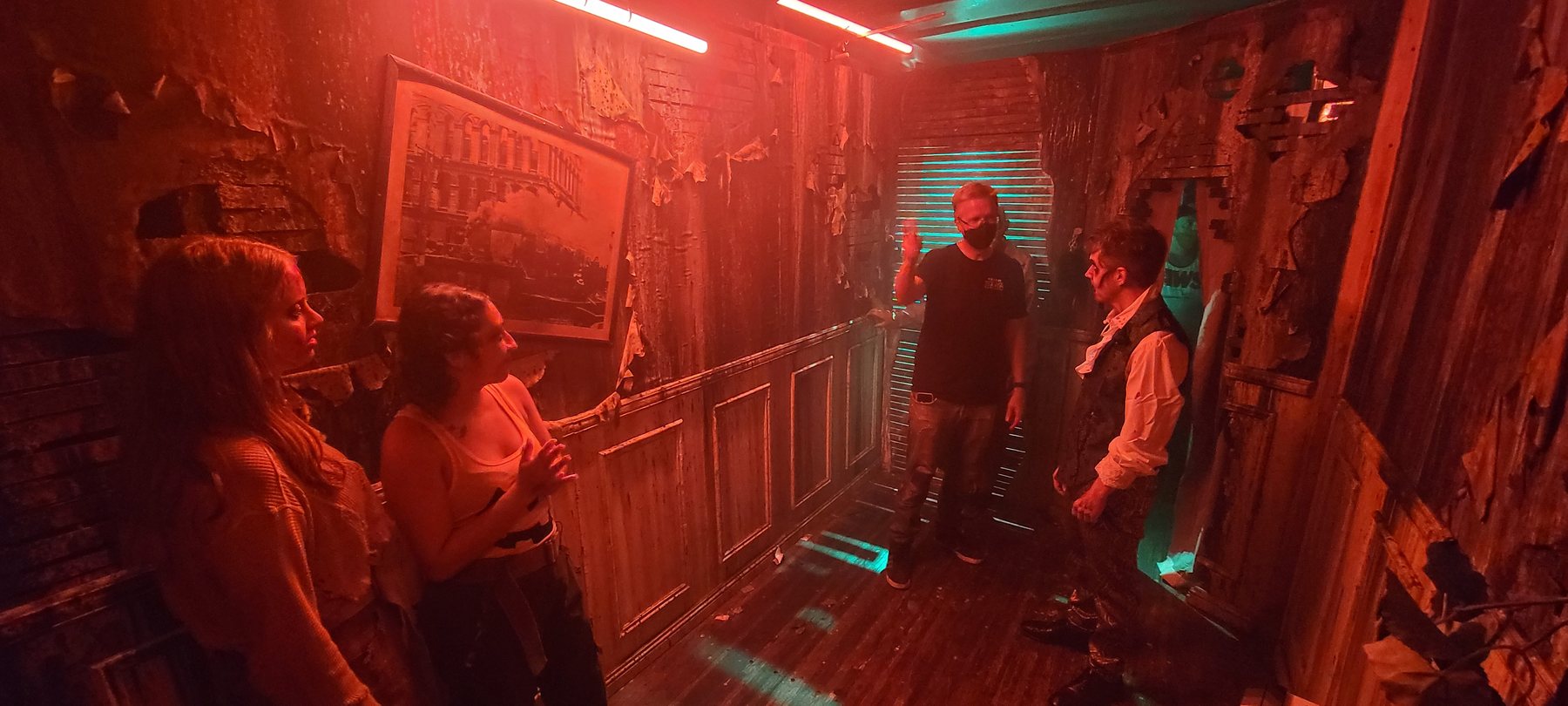 Director Jake Jarvi working with Sarah Elizabeth, Janet Jurado and Adam Hinkle inside Realm of Terror.