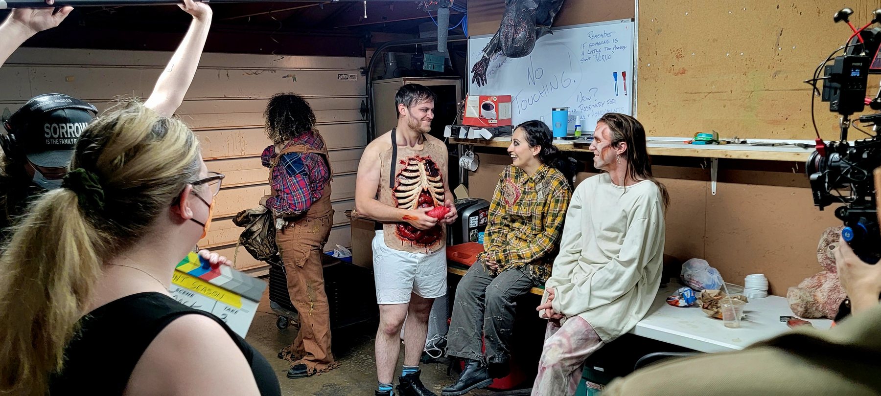 Rob Scallon, Janet Jurado and Patrick Gocek between setups during filming.