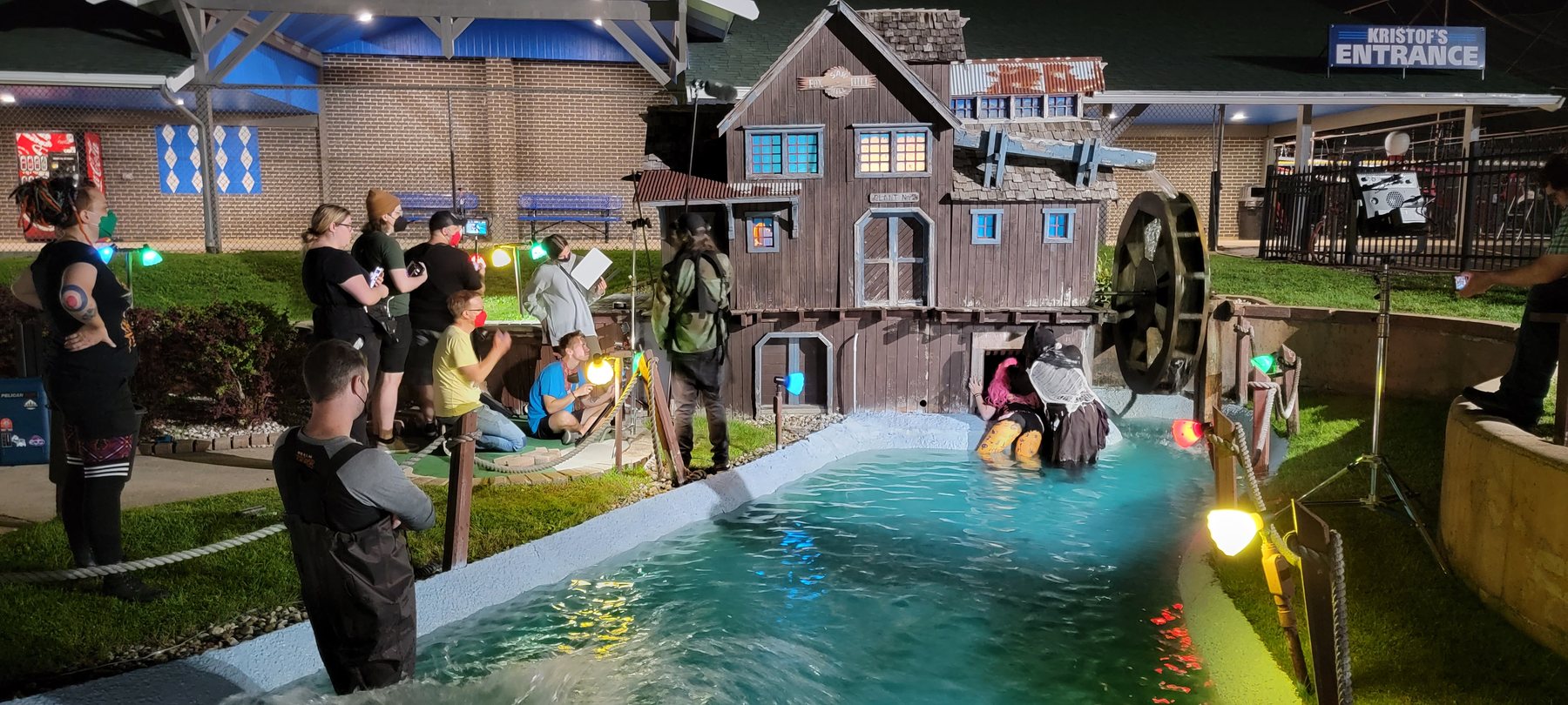 The Haunt Season crew filming the water wheel scene at Realm of Terror.