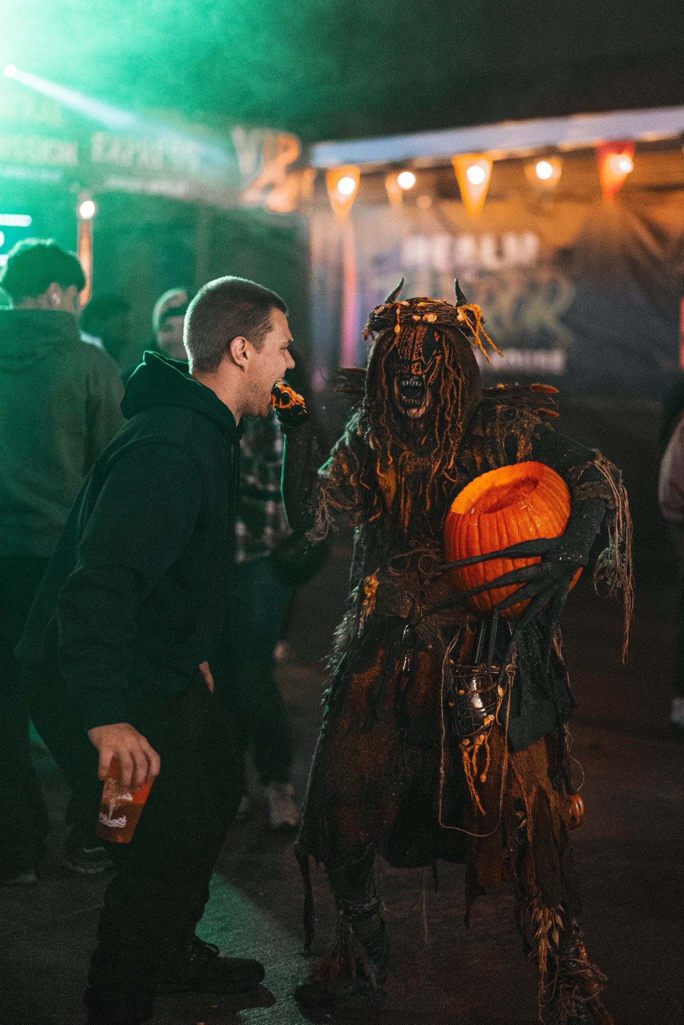 Realm of Terror event staff and live character interacting with guests during the 2025 season