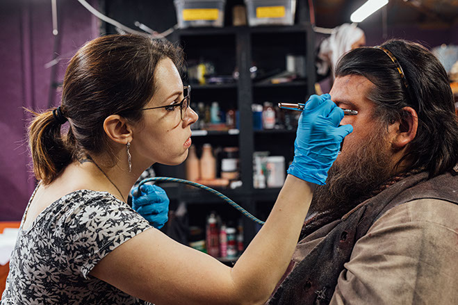 Realm of Terror makeup artist working behind the scenes
